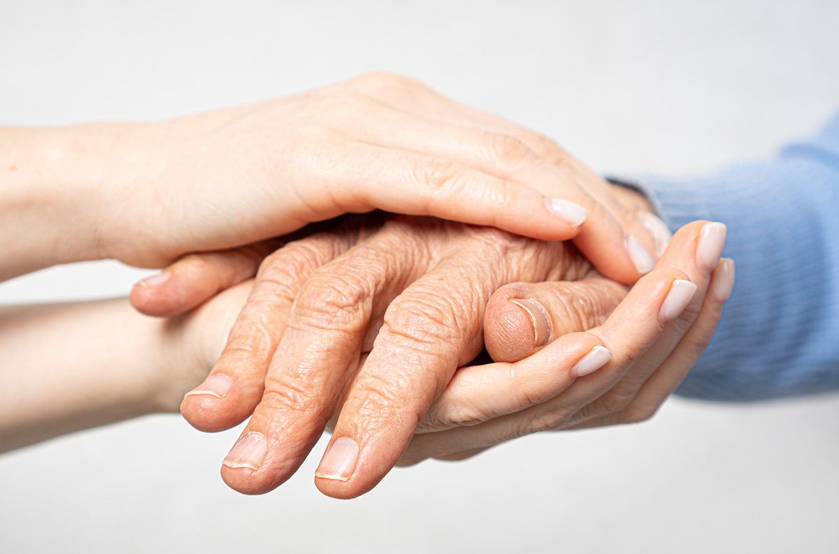 Young,Hands,Hold,Old,Hands.,Support,For,The,Elderly,Concept.