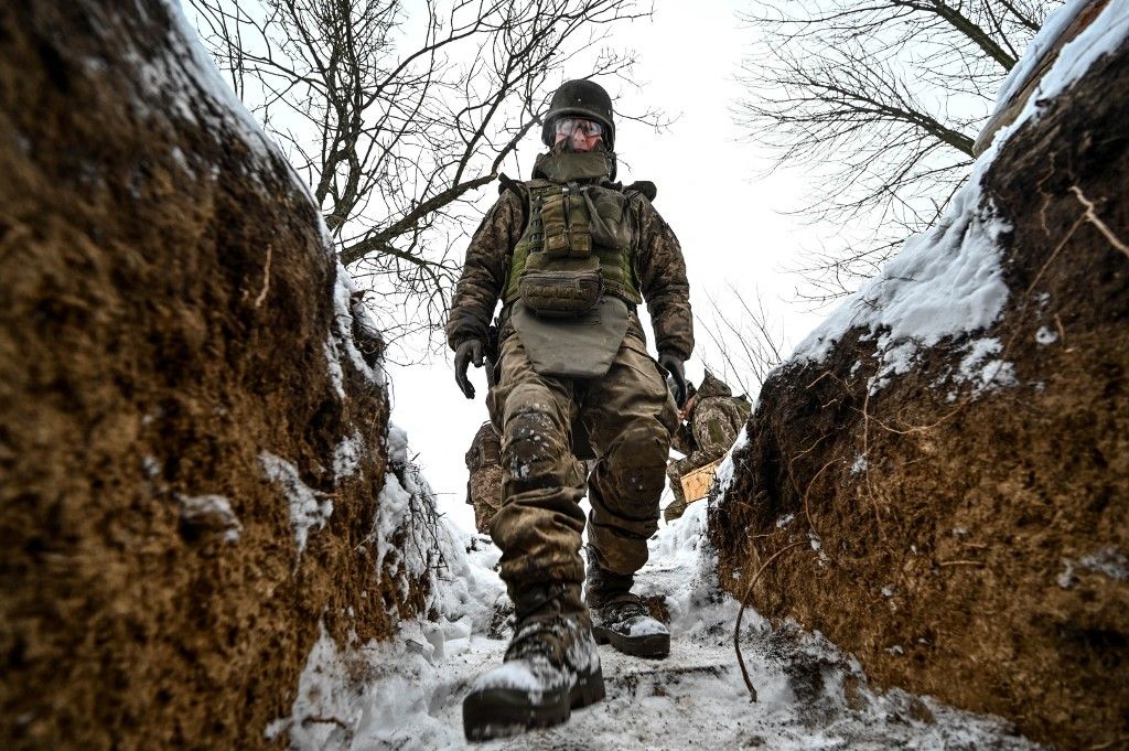 Soldiers of the 406th Separate Artillery Brigade defend the direction of Zaporizhia A soldier of the 66th Separate Artillery Battalion of the 406th Separate Artillery Brigade of the Armed Forces of Ukraine descends into a trench shelter in the direction of Zaporizhya, southeastern Ukraine, on January 14, 2024. Use Russia.  Do not use Belarus.  (Photo by Okrinform/NurPhoto) (Photo by Dmytro Smolenko/NurPhoto/NurPhoto via AFP)