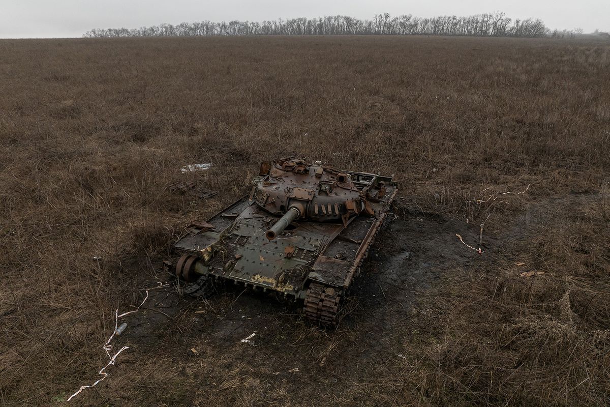 This aerial photograph shows a destroyed tank in a field outside the town of Izium, Kharkiv region, on January 27, 2024, amid the Russian invasion of Ukraine. (Photo by Roman PILIPEY / AFP)