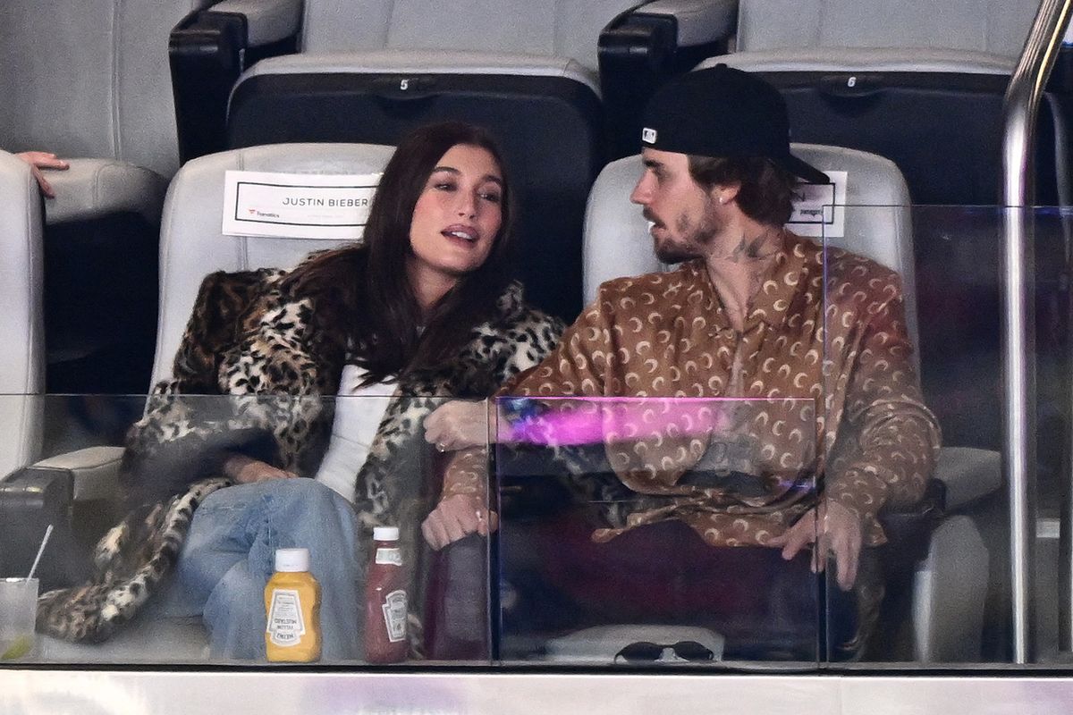 Canadian singer-songwriter Justin Bieber and his wife US model Hailey Bieber watch Super Bowl LVIII between the Kansas City Chiefs and the San Francisco 49ers at Allegiant Stadium in Las Vegas, Nevada, February 11, 2024. (Photo by Patrick T. Fallon / AFP)