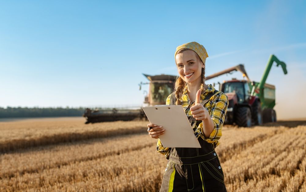 Farmer,With,Clipboard,On,Field,Keeping,Track,Of,The,Grain