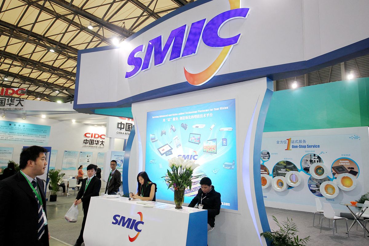 Chinas SMIC lands Qualcomm snapdragon chip orders--FILE--People visit the stand of SMIC (Semiconductor Manufacturing International Corporation) during an exhibition in Shanghai, China, 14 November 2013.Semiconductor Manufacturing International Corp. secured orders from Qualcomm Inc. (QCOM) to make chips for the worlds largest supplier of smartphone processors. SMIC, based in Shanghai, will work with the San Diego, California-based chip designer to make its Snapdragon processors, the companies said in a press release yesterday (3 July 2014). Using SMICs 28-nanometer technology, Qualcomm will have its marquee smartphone chip made in China as it seeks to tap into the worlds largest mobile market. The move could be a blow to Taiwan Semiconductor Manufacturing Co., the biggest made-to-order chip foundry, which previously struggled to fill orders, causing a shortage, and has Qualcomm as its biggest customer. SMIC, which posted its second consecutive year-on-year drop in profit in the first quarter, currently makes simpler chips for Qualcomm that help regulate power and wireless connections. (Photo by dycj / Imaginechina / Imaginechina via AFP)
