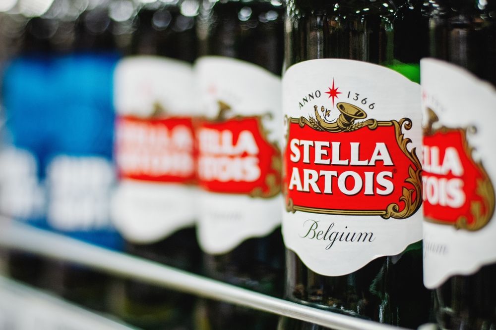 Bottles,Of,Stella,Artois,Belgian,Beer,On,The,Supermarket,Shelf,