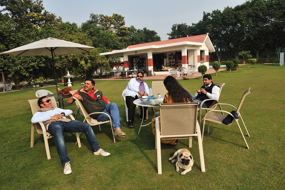 DELHI, INDIA - DECEMBER 5, 2010: Delhi socialites hang out at a farm and at the Jaipur Polo Grounds in South Delhi, New Delhi, India, December 5, 2010. (Photographs by Lynsey Addario/Getty Images Reportage)