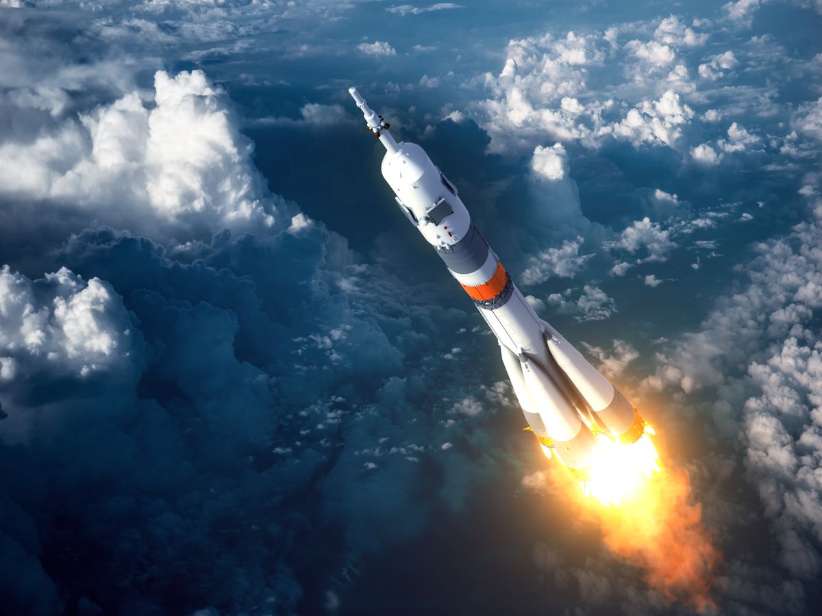 Carrier,Rocket,Launch,In,The,Clouds.,3d,Scene.