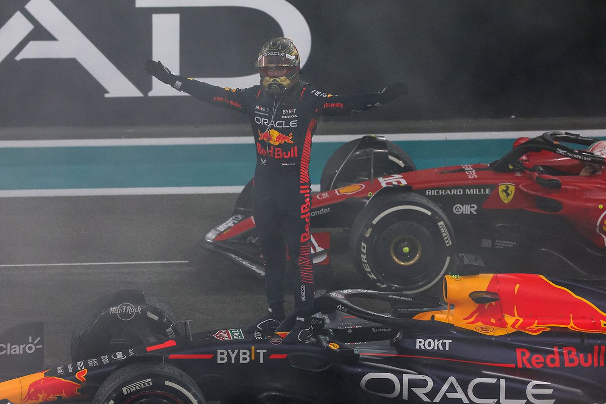 Red Bull Racing's Dutch driver Max Verstappen celebrates winning the Abu Dhabi Formula One Grand Prix at the Yas Marina Circuit in the Emirati city on November 26, 2023. (Photo by Giuseppe CACACE / AFP)