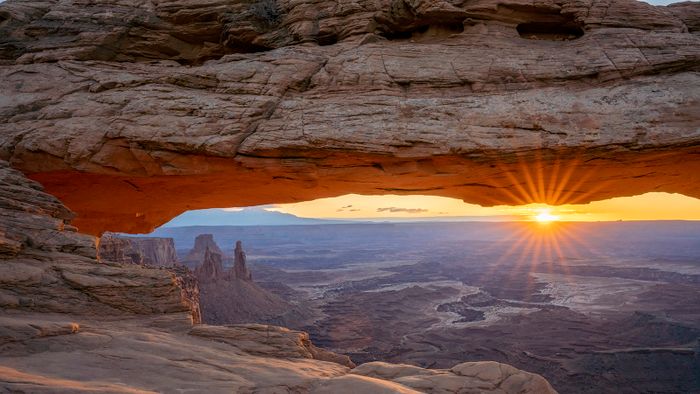 Close up view of canyon through Mesa Arch at sunrise, Canyondlands National Park, Utah, United States
Close up view of canyon through Mesa Arch at sunrise, Canyonlands National Park, Utah, United States of America, North America (Photo by Andrew Coleman / Robert Harding RF / robertharding via AFP)
