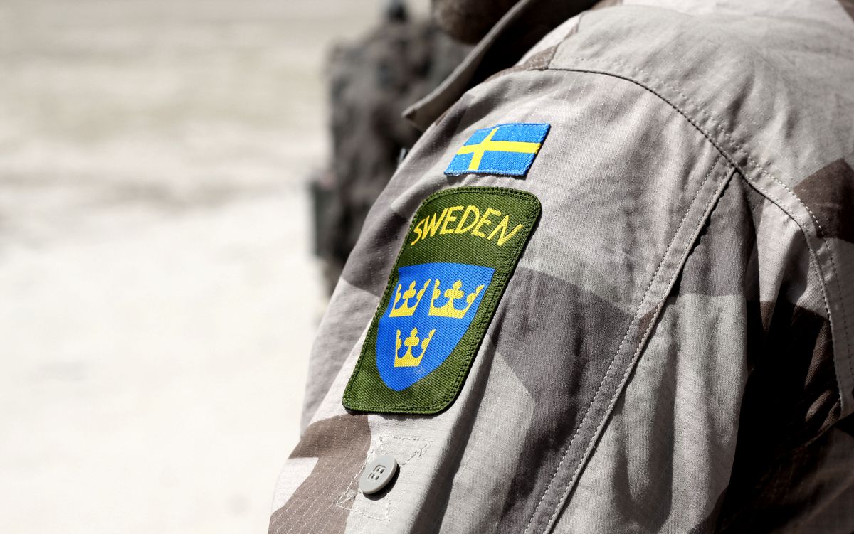 Swedish armpatchArmpatch with swedish flag on the arm of a peacekeeping swedish ISAF-soldier in Afghanistan.