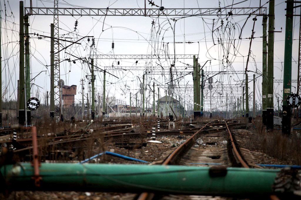 UKRAINE-RUSSIA-CONFLICT-WARThis photograph shows war damaged railroad tracks and power lines in the Sosnove village, Donetsk region on March 1, 2023, amid the Russian invasion of Ukraine. (Photo by Anatolii Stepanov / AFP)
