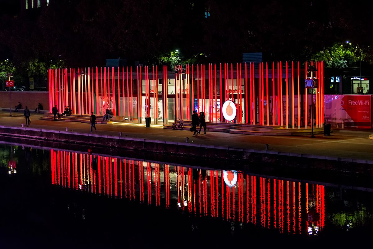 Milan,,Italy,-,October,19th,,2015:high,Luminous,Red,Pillars,With