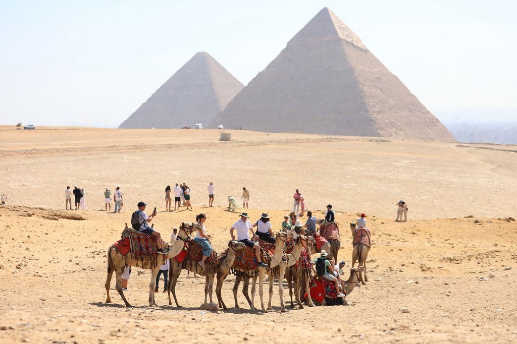 Tourists flock to the Pyramids of Giza