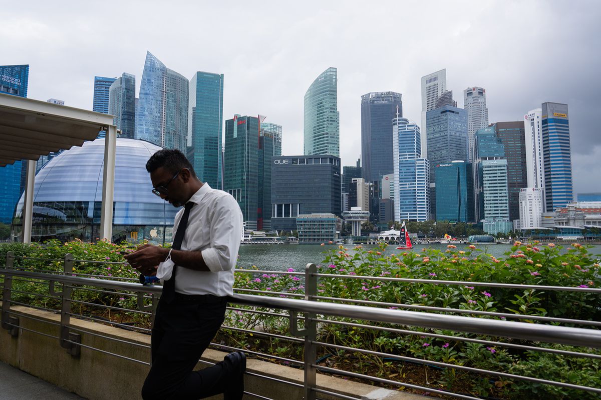 Buildings in the central business district in Singapore, on Wednesday, Feb. 14, 2024. Singapore's economy expanded by a slightly more modest pace than initially expected in 2023, as manufacturing activity contracted and services growth slowed. Photographer: Nicky Loh/Bloomberg via Getty Images