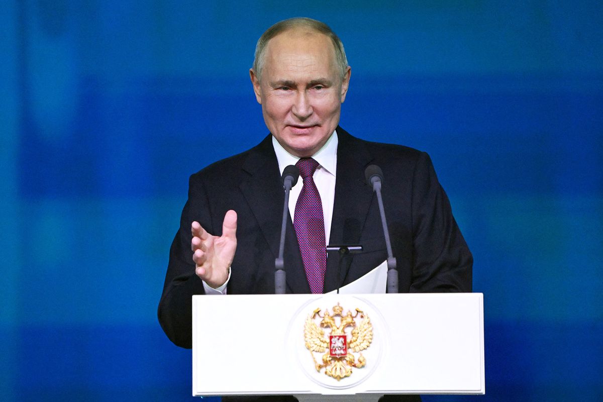 In this pool photograph distributed by Russian state agency Sputnik, Russia's President Vladimir Putin addresses the audience during the celebration of the 300th anniversary of the Russian Academy of Sciences in Moscow on February 8, 2024. (Photo by Sergei GUNEYEV / POOL / AFP)