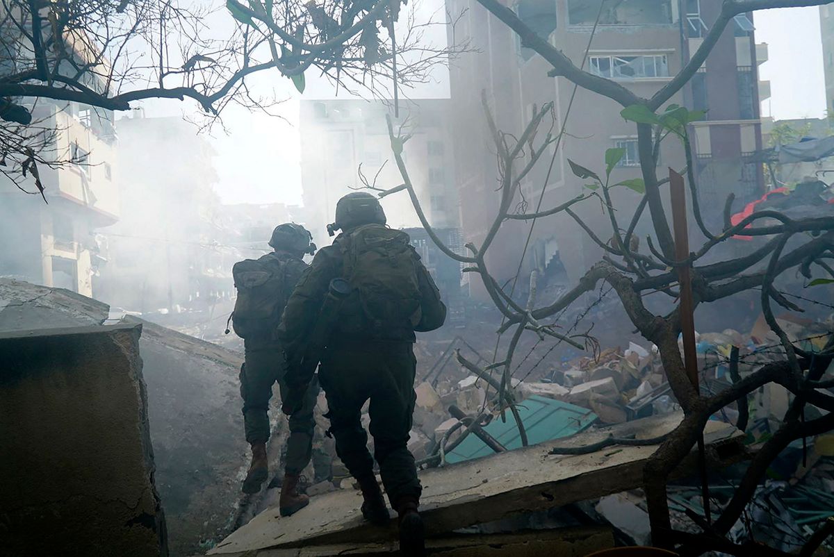 This handout picture released by the Israeli army on February 13, 2024, shows troops on the ground in the Gaza Strip, amid ongoing battles between Israel and the Palestinian militant group Hamas. (Photo by Israeli Army / AFP) / === RESTRICTED TO EDITORIAL USE - MANDATORY CREDIT "AFP PHOTO / Handout / Israeli Army' - NO MARKETING NO ADVERTISING CAMPAIGNS - DISTRIBUTED AS A SERVICE TO CLIENTS ==