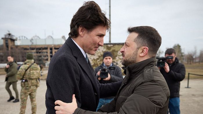In this handout photograph taken and released by Ukrainian Presidential Press Service on February 24, 2024, Ukraine's President Volodymyr Zelensky (R) greets Canada's Prime Minister Justin Trudeau (L) in Hostomel, Kyiv region, during a visit on the second anniversary of the Russian invasion of Ukraine. (Photo by Handout / UKRAINIAN PRESIDENTIAL PRESS SERVICE / AFP) / RESTRICTED TO EDITORIAL USE - MANDATORY CREDIT "AFP PHOTO / UKRAINIAN PRESIDENTIAL PRESS SERVICE " - NO MARKETING NO ADVERTISING CAMPAIGNS - DISTRIBUTED AS A SERVICE TO CLIENTS
