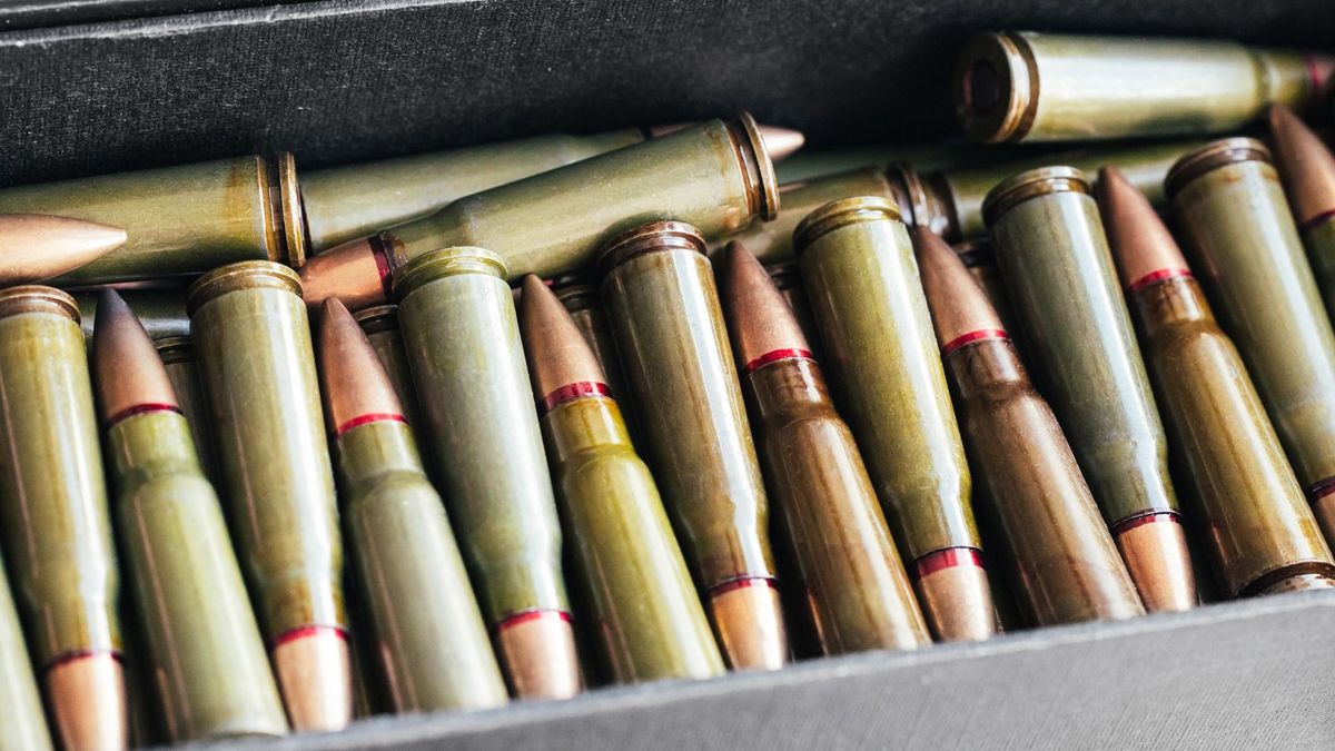 Ammo box with 7.62 mm cartridges for Kalashnikov assault rifleAmmo box with 7.62 mm cartridges for Kalashnikov assault rifle. Bullets for gunAmmo box with 7.62 mm cartridges for Kalashnikov assault rifle. Bullets for gun