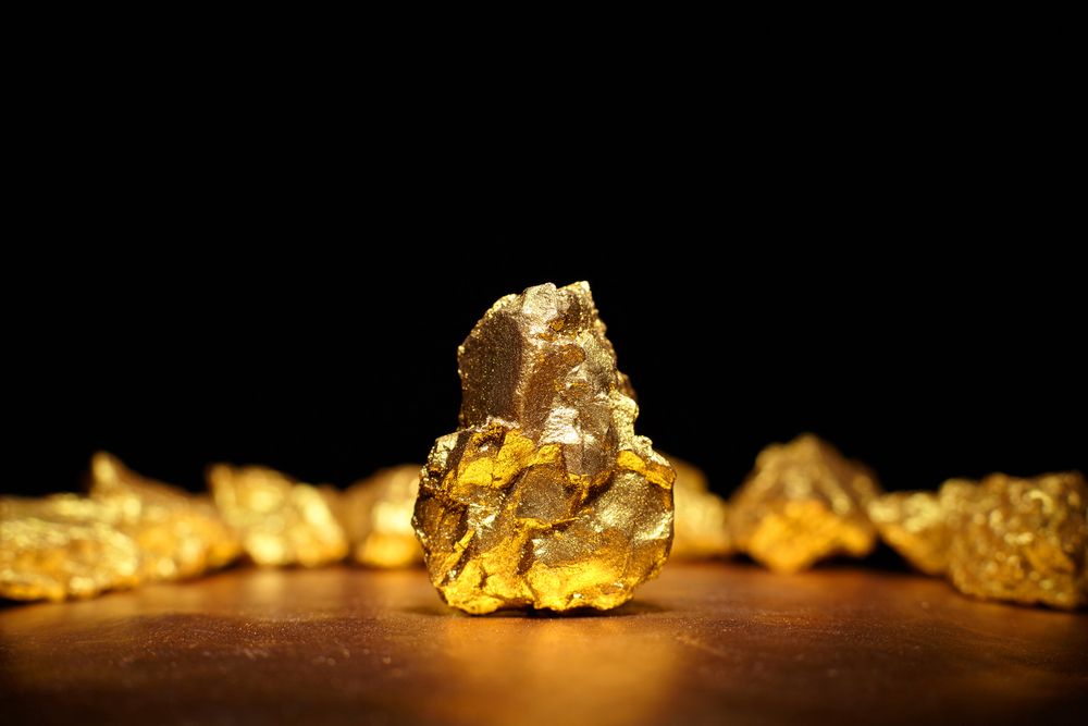 Closeup,Of,Big,Gold,Nugget,Finance,Concept