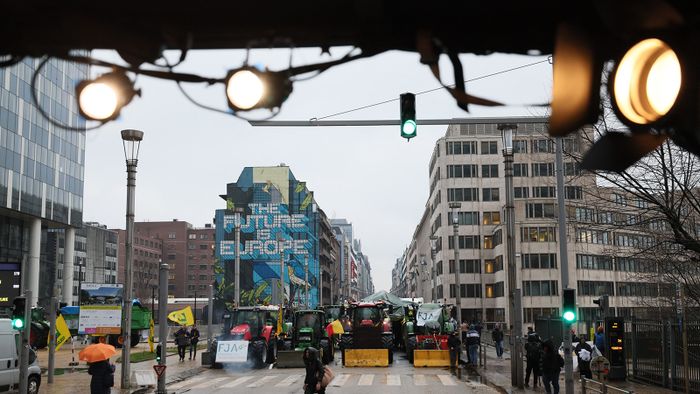 Farmers on their tractors take part in a protest called by the farmers' organizations 'Federation Unie de Groupements d'Eleveurs et d'Agriculteurs' (FUGEA), Boerenforum and MAP, in response to the European Agriculture Council, on "rue de la Loi" in Brussels, on February 26, 2024. Farmers across Europe have been protesting for weeks over what they say are excessively restrictive environmental rules, competition from cheap imports from outside the European Union and low incomes. (Photo by BENOIT DOPPAGNE / Belga / AFP) / Belgium OUT