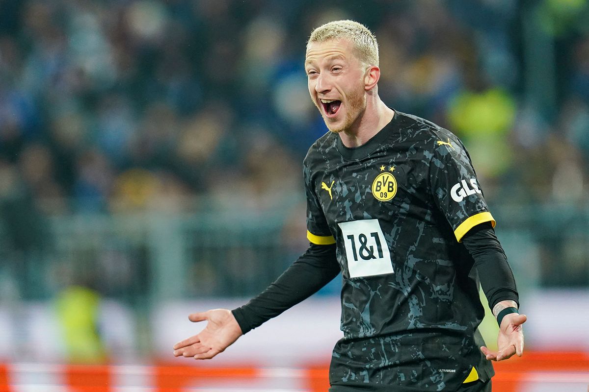 13 January 2024, Hesse, Darmstadt: Soccer: Bundesliga, SV Darmstadt 98 - Borussia Dortmund, Matchday 17, Merck Stadium at Böllenfalltor. Dortmund's scorer Marco Reus celebrates the goal for 0:2. Photo: Uwe Anspach/dpa - IMPORTANT NOTE: In accordance with the regulations of the DFL German Football League and the DFB German Football Association, it is prohibited to utilize or have utilized photographs taken in the stadium and/or of the match in the form of sequential images and/or video-like photo series. (Photo by UWE ANSPACH / DPA / dpa Picture-Alliance via AFP)