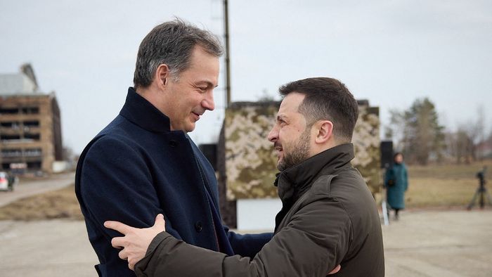 In this handout photograph taken and released by Ukrainian Presidential Press Service on February 24, 2024, Ukraine's President Volodymyr Zelensky (R) greets Belgium's Prime Minister Alexander De Croo (L) in Hostomel, Kyiv region, during a visit on the second anniversary of the Russian invasion of Ukraine. (Photo by Handout / UKRAINIAN PRESIDENTIAL PRESS SERVICE / AFP) / RESTRICTED TO EDITORIAL USE - MANDATORY CREDIT "AFP PHOTO / UKRAINIAN PRESIDENTIAL PRESS SERVICE " - NO MARKETING NO ADVERTISING CAMPAIGNS - DISTRIBUTED AS A SERVICE TO CLIENTS