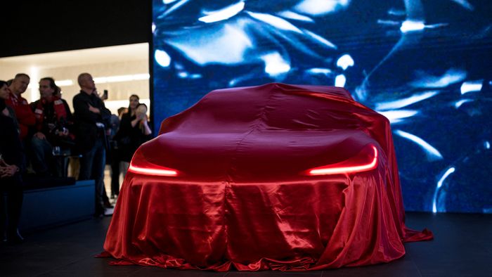 The new IM L6 electric model car is presented as World premiere at the booth of MG Motor company owned by Chinese state-owned carmaker SAIC on February 26, 2024 during a press day ahead of the Geneva International Motor Show in Geneva. (Photo by Fabrice COFFRINI / AFP)