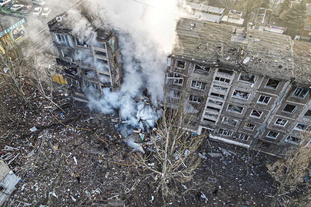 UKRAINE-RUSSIA-CONFLICT-WARThis handout photograph taken and released by National Police of Ukraine on February 14, 2024, shows rescuers extinguish a fire in a residential building following a missile attack in Selydove, Donetsk region, amid the Russian invasion of Ukraine. Ukrainian officials said a Russian rocket strike killed at least three people, including a 38-year-old pregnant woman and her nine-year-old son. (Photo by Handout / National Police of Ukraine / AFP) / RESTRICTED TO EDITORIAL USE - MANDATORY CREDIT "AFP PHOTO /HO/ NATIONAL POLICE OF UKRAINE" - NO MARKETING NO ADVERTISING CAMPAIGNS - DISTRIBUTED AS A SERVICE TO CLIENTS