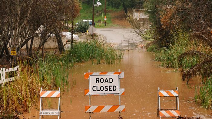 Ventura, CA - February 04: Flooding is seen along Camp Chafee Road at Casitas Vista Road on Sunday, Feb. 4, 2024 in Ventura, CA. Officials across Southern and Central California are urgently warning residents to prepare as a storm system fueled by an atmospheric river brings heavy rainfall.  (Dania Maxwell / Los Angeles Times via Getty Images)