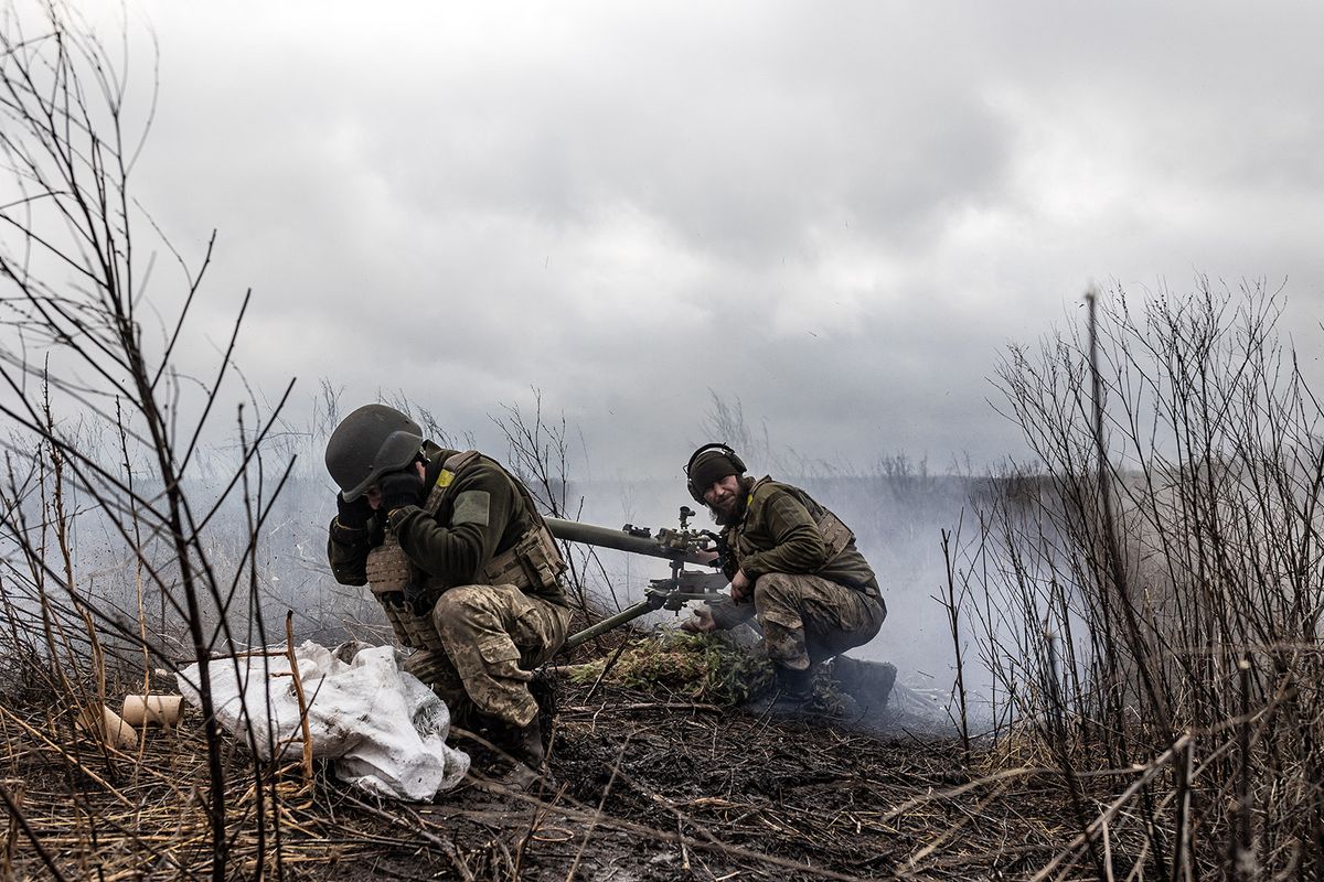 DONETSK OBLAST, UKRAINE - FEBRUARY 04: Ukrainian soldiers firing with a SPG, in the direction of Bakhmut, where clashes between Russia and Ukraine continue to take place, in Donetsk Oblast, Ukraine on February 04, 2024. Diego Herrera Carcedo / Anadolu (Photo by Diego Herrera Carcedo / ANADOLU / Anadolu via AFP)
