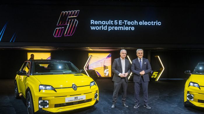 Renault group's general director Luca De Meo (L) and Renault brand CEO Fabrice Cambolive pose with the Renault R5 E-Tech electric model car introduced as world premiere by the French carmaker on February 26, 2024 during a press day ahead of the Geneva International Motor Show in Geneva. (Photo by Fabrice COFFRINI / AFP)
