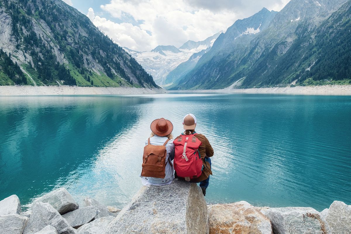 Travelers,Couple,Look,At,The,Mountain,Lake.,Travel,And,Active