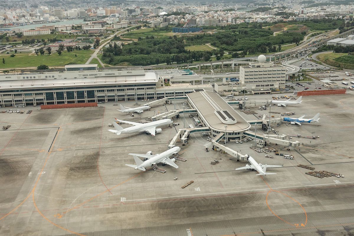 Naha Airport in Okinawa prefecture of Japan aerial view from airplane
