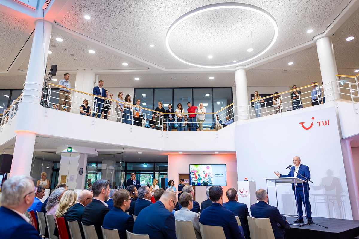 25 August 2023, Lower Saxony, Hanover: Sebastian Ebel (r), CEO of TUI AG, speaks at an opening event of the new Group headquarters of the Tui travel group in Hanover. At the new Group headquarters, the Tui Group is bringing together 2,800 employees from eight Group companies, who were previously spread across three locations in Hanover. Photo: Moritz Frankenberg/dpa (Photo by Moritz Frankenberg / DPA / dpa Picture-Alliance via AFP)