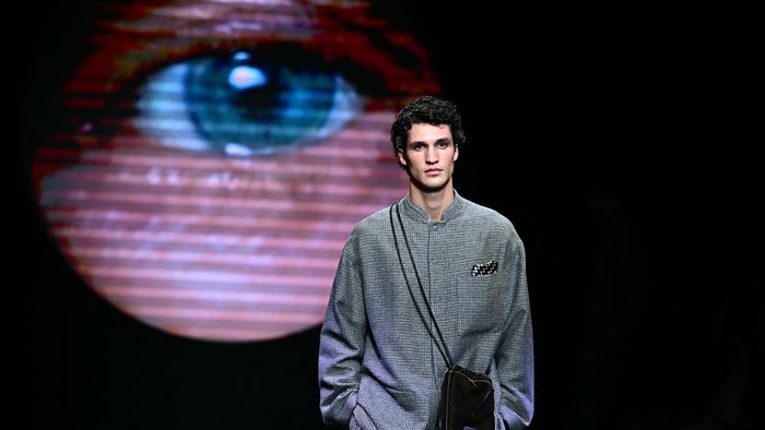 A model walks the runway at the Giorgio Armani collection show during the Milan Fashion Week Menswear Autumn/Winter 2024/2025 on January 15, 2024 in Milan. (Photo by GABRIEL BOUYS / AFP)