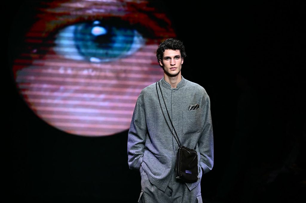 A model walks the runway at the Giorgio Armani collection show during the Milan Fashion Week Menswear Autumn/Winter 2024/2025 on January 15, 2024 in Milan. (Photo by GABRIEL BOUYS / AFP)