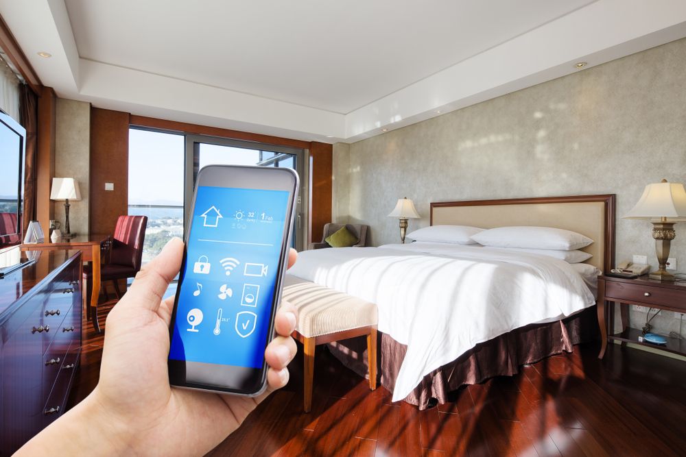 Mobile,Phone,With,Smart,Home,App,In,Modern,Bed,Room