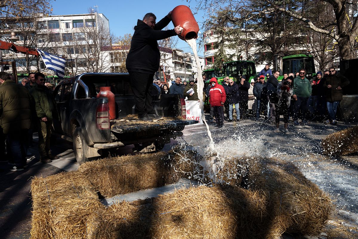 Farmers' protest rally in the central square of Larissa, Thessaly, Greece on January 29, 2024. Farmers across the country are intensifying protests by blocking main roads with their tractors, demanding low production costs, protection against natural disasters, guaranteed selling prices that match costs production while ensuring a living income and affordable prices for basic consumer goods. (Photo by Konstantinos Tsakalidis / SOOC / SOOC via AFP)
