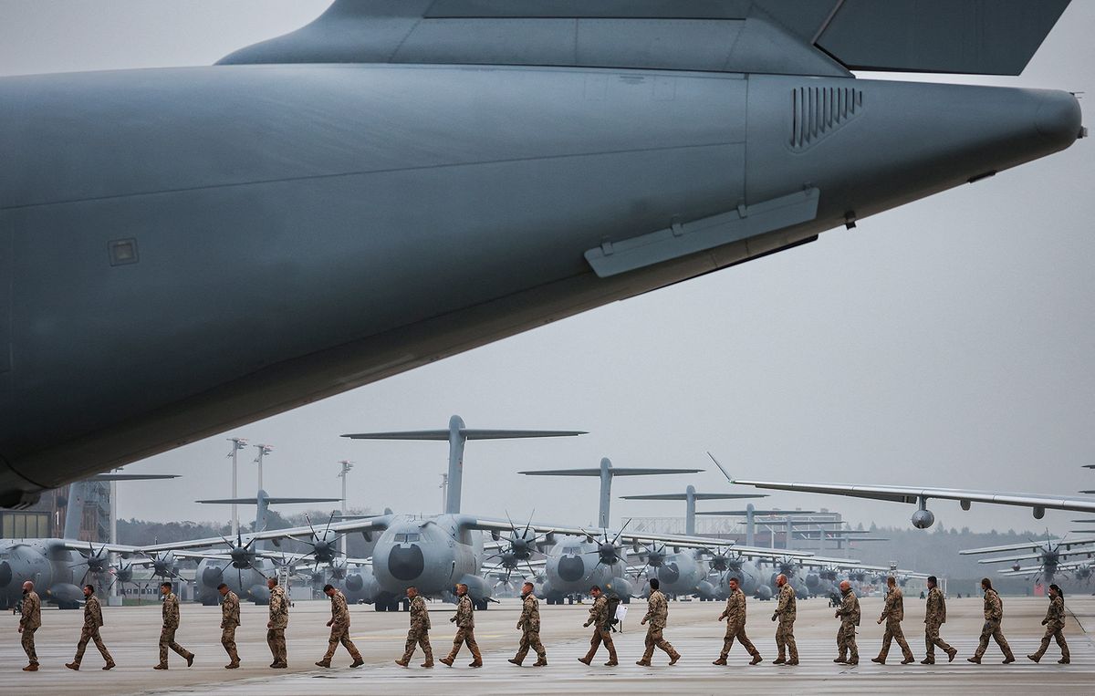 Returning troops of the German armed forces Bundeswehr who had served under the UN mission in Mali, MINUSMA, disembark of an A400M military cargo aircraft at the military air base in Wunstorf, northern Germany, on December 15, 2023. Germany on December 12, 2023 said it had ended its participation in the MINUSMA, in a pullout ordered by Mali's military leaders, after German troops had been a key pillar of the MINUSMA mission since Paris pulled its forces out from Mali in 2022. (Photo by Ronny Hartmann / AFP)