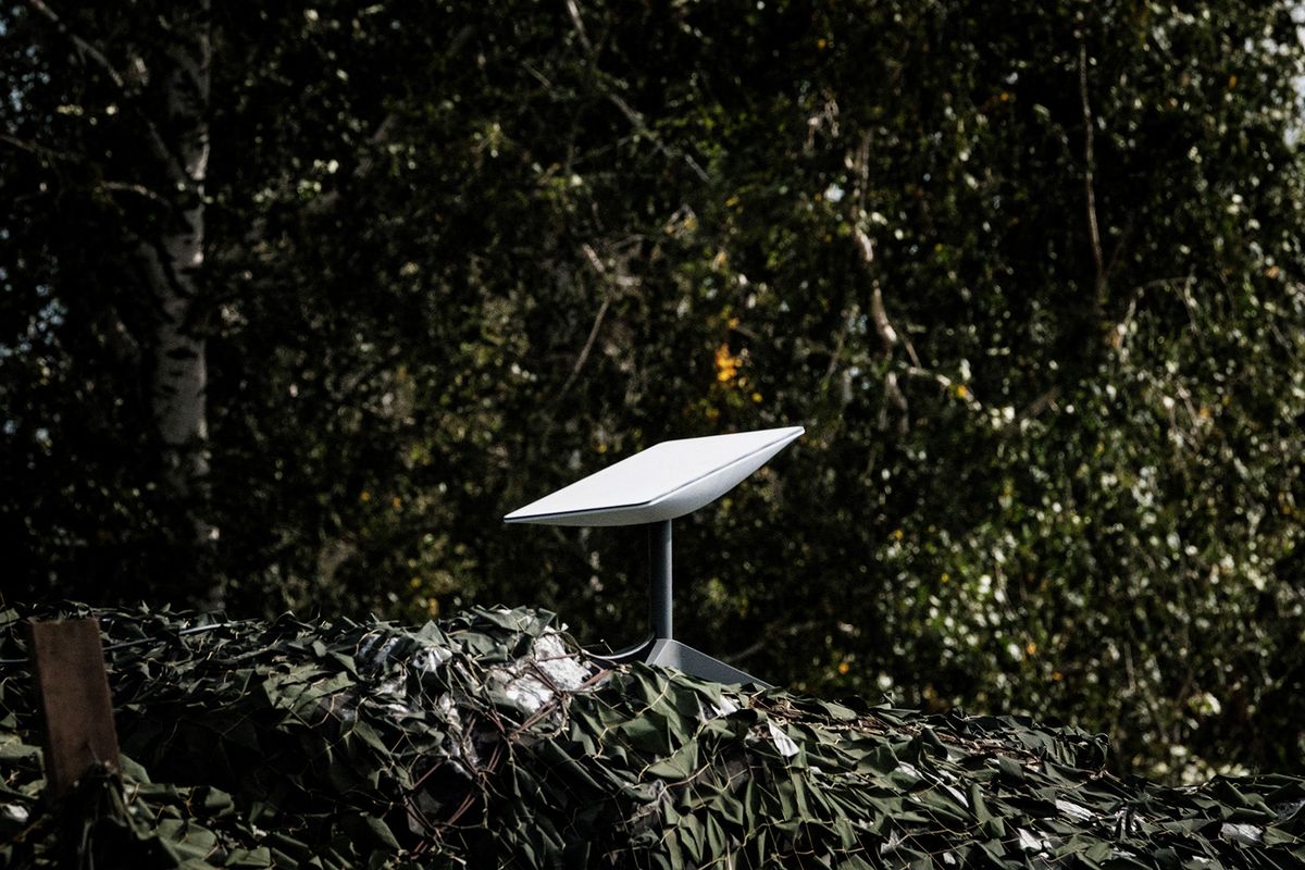 This photograph taken on September 25, 2022, shows an antenna of the Starlink satellite-based broadband system donated by the US tech billionaire Elon Musk in Izyum, Kharkiv region, amid the Russian invasion of Ukraine. (Photo by Yasuyoshi CHIBA / AFP)