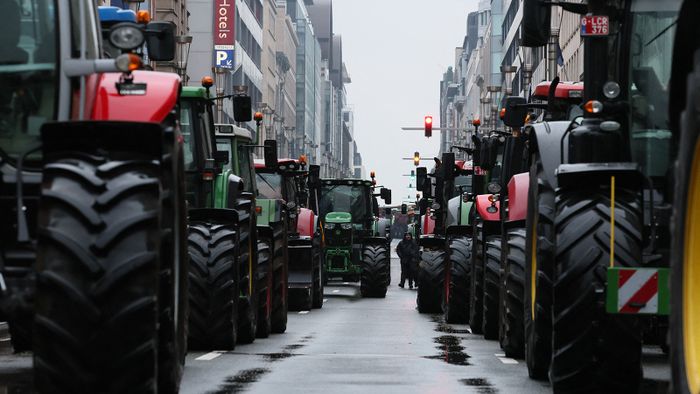 Farmers on their tractors take part in a protest called by the farmers' organizations 'Federation Unie de Groupements d'Eleveurs et d'Agriculteurs' (FUGEA), Boerenforum and MAP, in response to the European Agriculture Council, in Brussels, on February 26, 2024. Farmers across Europe have been protesting for weeks over what they say are excessively restrictive environmental rules, competition from cheap imports from outside the European Union and low incomes. (Photo by BENOIT DOPPAGNE / Belga / AFP) / Belgium OUT