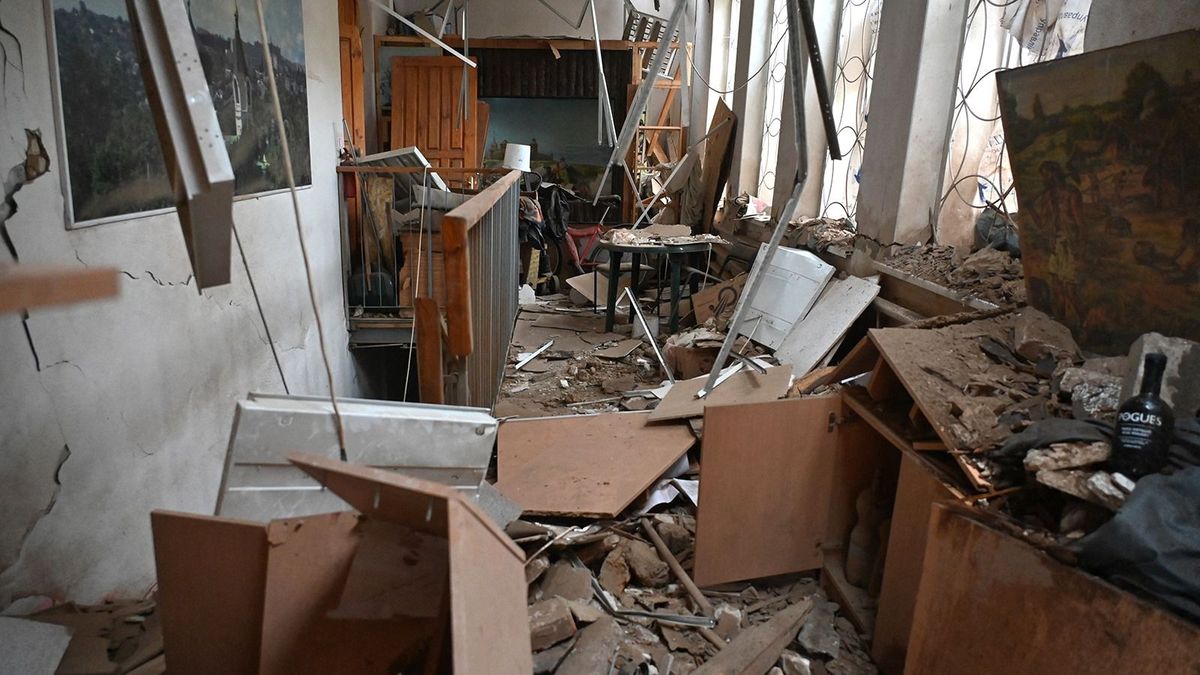 This photograph taken on April 25, 2023, shows debris inside the building of the local history museum destroyed following Russian missile strike in the town of Kupyansk, Kharkiv region, amid the Russian invasion of Ukraine. President Volodymyr Zelensky on April 25 said Russia was trying to erase Ukraine's history and culture after a strike on a museum killed one employee and wounded 10. (Photo by SERGEY BOBOK / AFP)