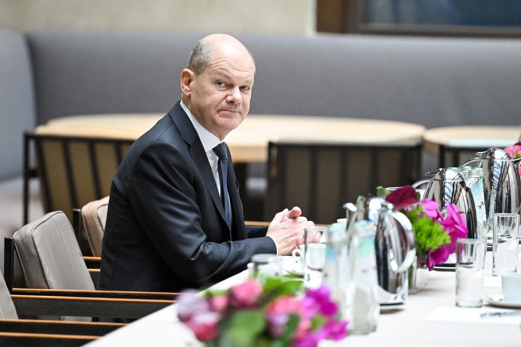 German Chancellor Olaf Scholz waits for the start of a bilateral meeting at the Munich Security Conference (MSC) in Munich, southern Germany on February 17, 2024. (Photo by Tobias Hase / POOL / AFP)