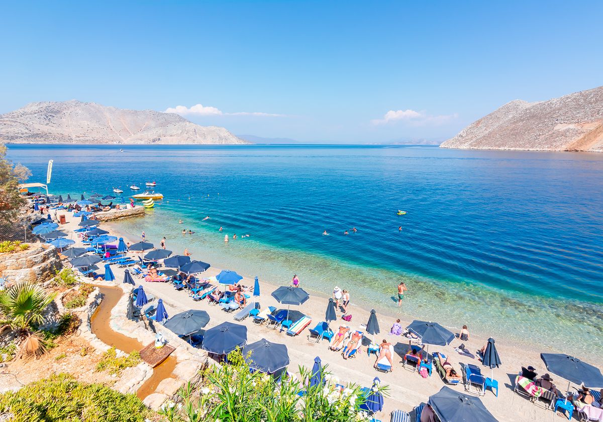 Symi,,Greece,-,September,2019:,Nos,Beach,On,Symi,Island