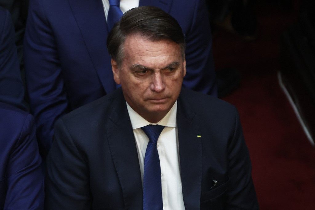 Brazil's former President Jair Bolsonaro attends the inauguration of Argentina's new president Javier Milei (out of frame) at the Congress in Buenos Aires on December 10, 2023. Libertarian economist Javier Milei was sworn in Sunday as Argentina's president, after a resounding election victory fueled by fury over the country's economic crisis. (Photo by ALEJANDRO PAGNI / AFP)