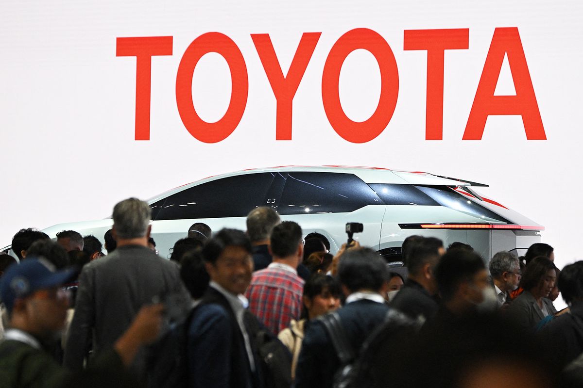 (FILES) The logo of Toyota Motor is seen during the press day of the Japan Mobility Show in Tokyo on October 25, 2023. Toyota said on January 29, 2024 it was suspending shipments of 10 models that use engines linked with testing irregularities at an affiliate company. (Photo by Kazuhiro NOGI / AFP)