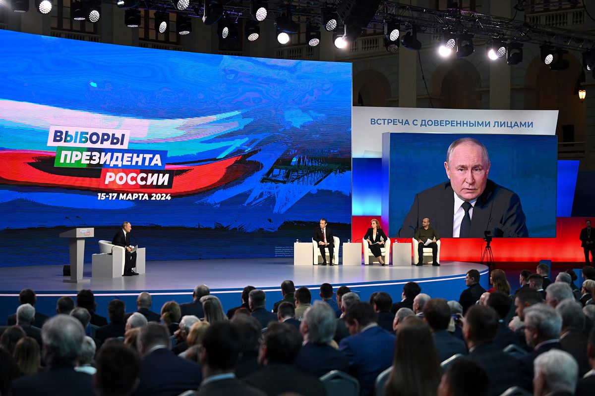 Russian President and presidential candidate Vladimir Putin meets with his confidants ahead of the upcoming presidential election in Moscow on January 31, 2024. The election will be held over a three-day period from March 15 to 17. (Photo by Natalia KOLESNIKOVA / AFP)