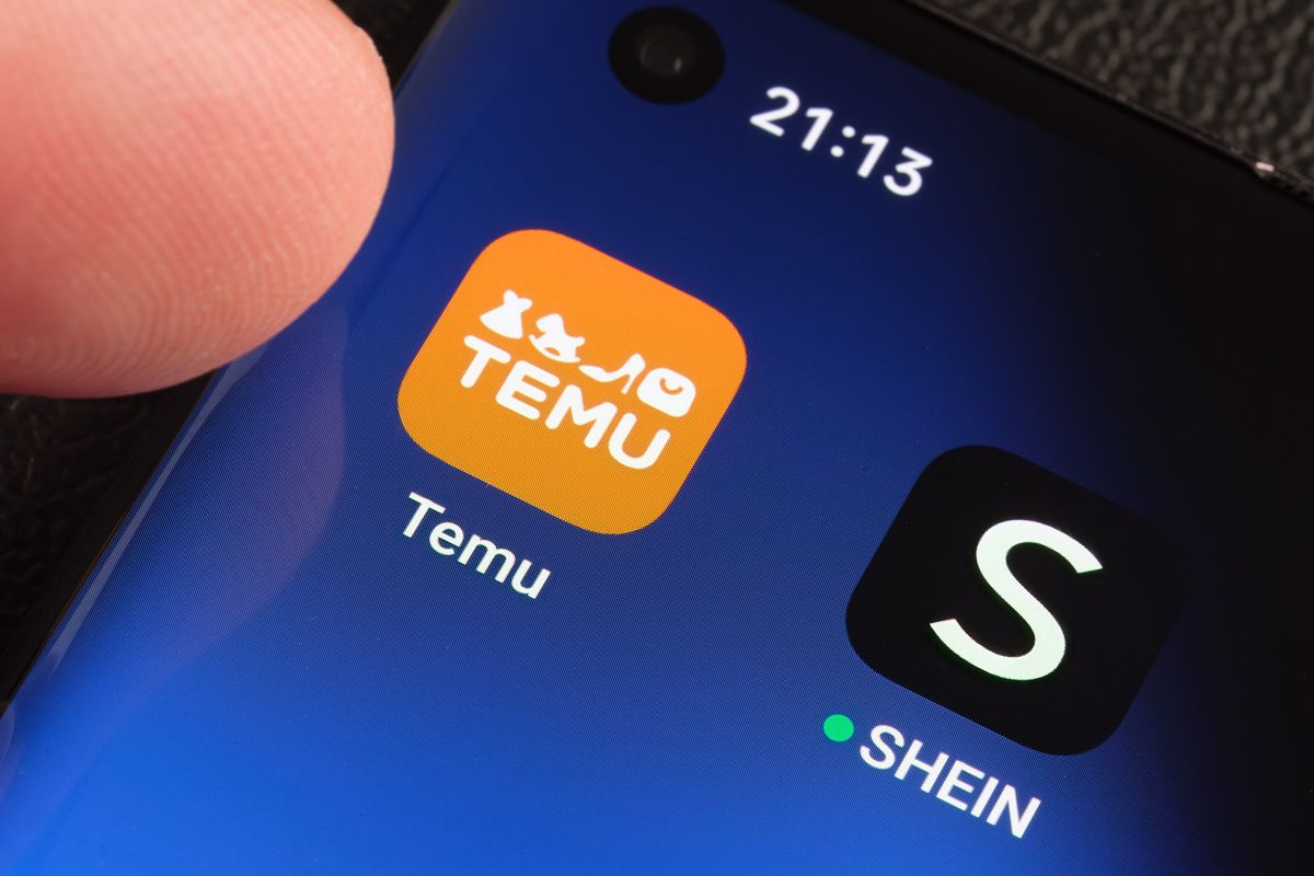 Shein and Temu,And,Shein,Apps,Seen,On,The,Screen,Of,Smartphone.