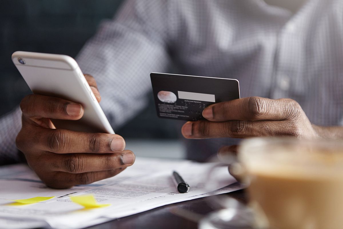 Cropped,Shot,Of,African-american,Businessman,Paying,With,Credit,Card,Online