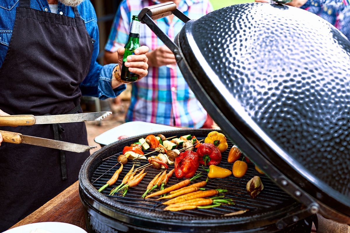 Close up of vegetables cooking on barbecue