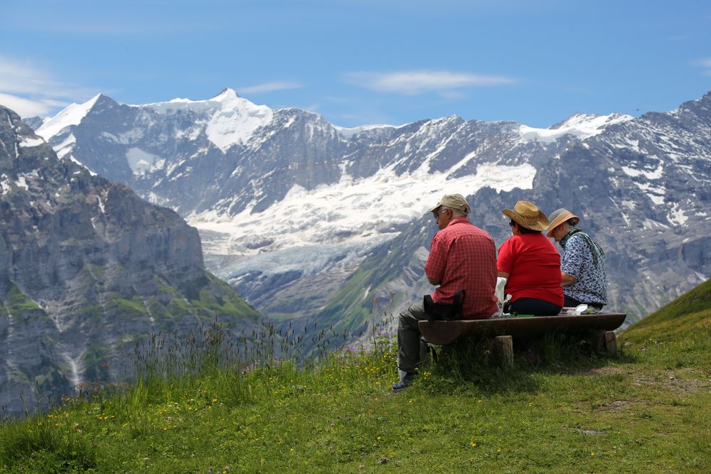 Grindelwald,Switzerland,-,July,15,,2020:,Three,Pensioners,Are,Sitting