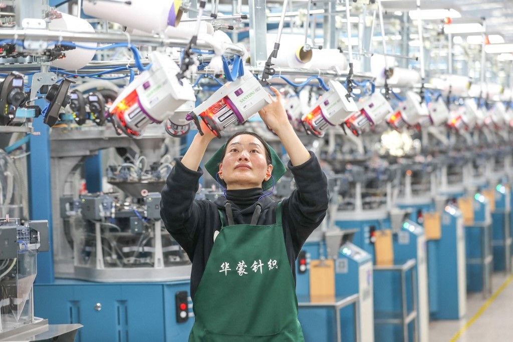 A Knitting Company in HuzhouWorkers are producing knitting products for export at a production workshop of a knitting company in Moganshan High-tech Zone in Huzhou, China, on February 18, 2024. (Photo by Costfoto/NurPhoto) (Photo by CFOTO / NurPhoto / NurPhoto via AFP)